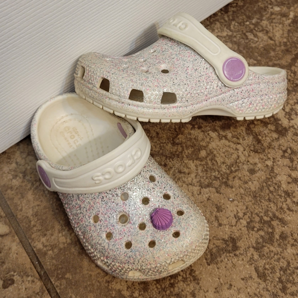 White & Sparkly Crocs. W/ shell Jibbitz size 6C (toddler)